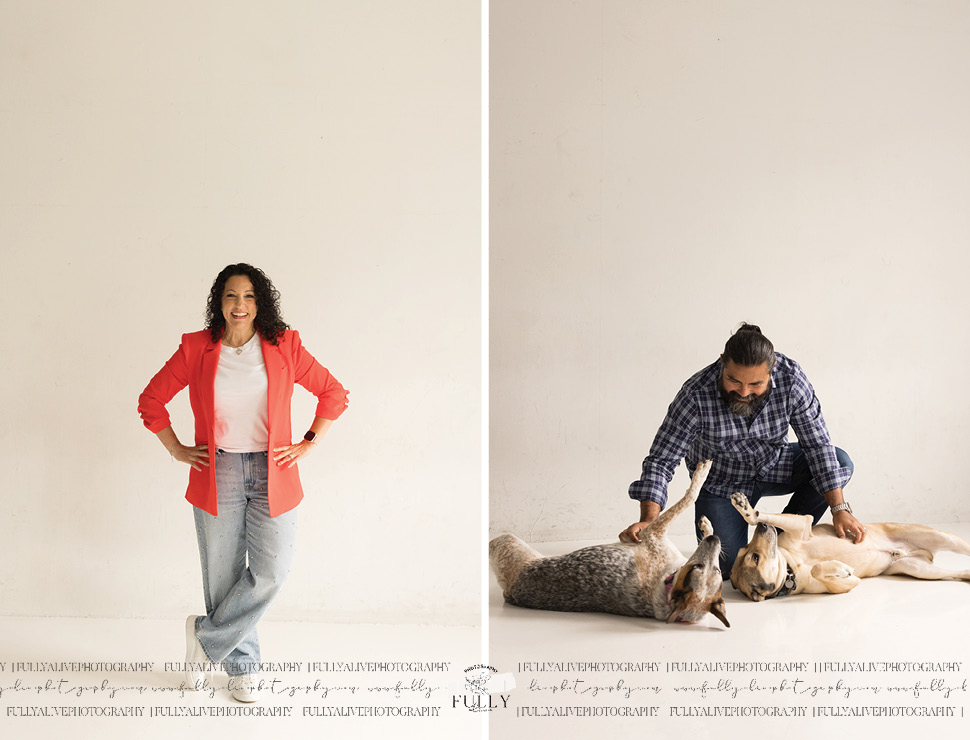 couple in a studio with their dogs enjoying a family photoshoot